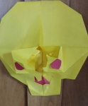3-D Skull with helmet eyes and scissor shape